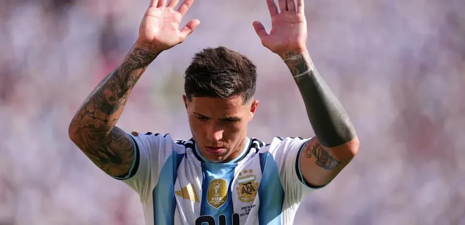 Player with raised hands in Argentina jersey