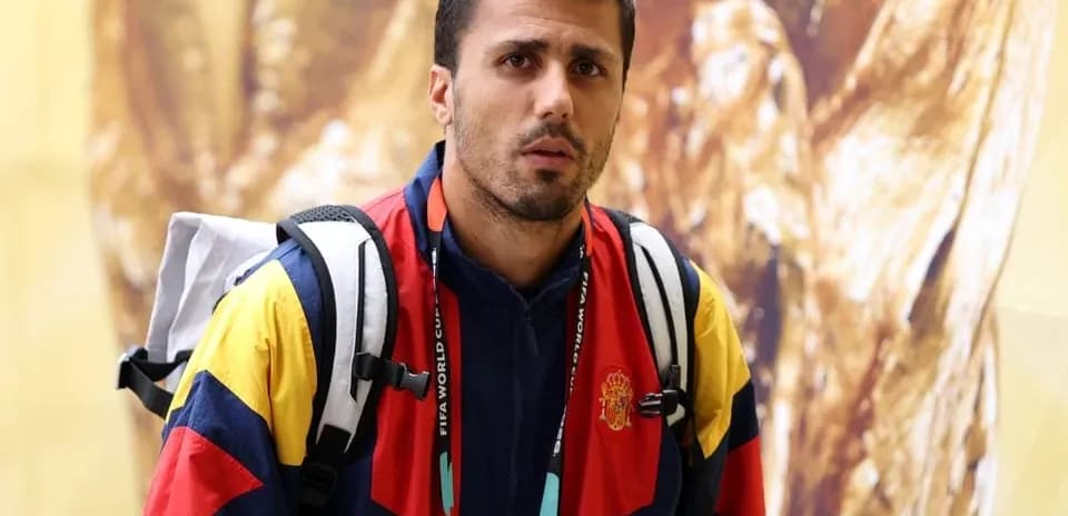 Player wearing national team jacket at event
