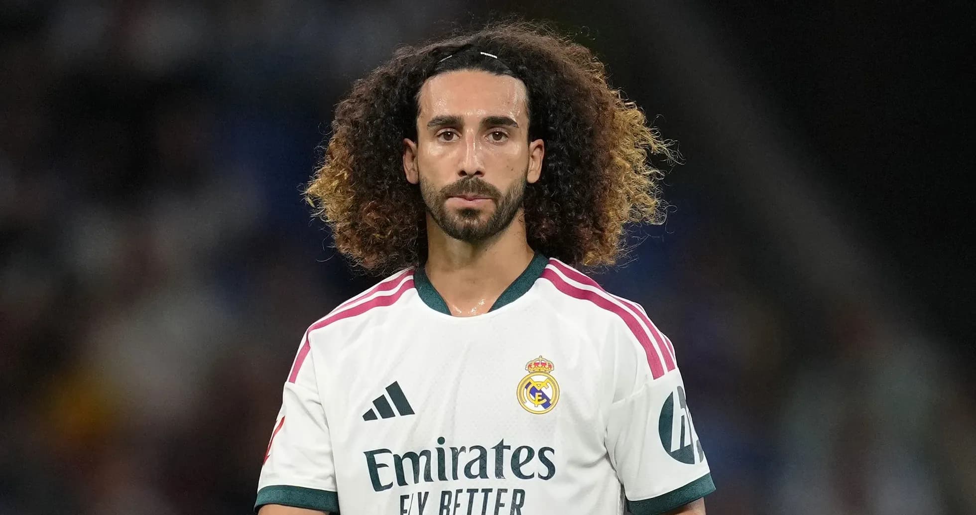 Player wearing Real Madrid jersey on the field