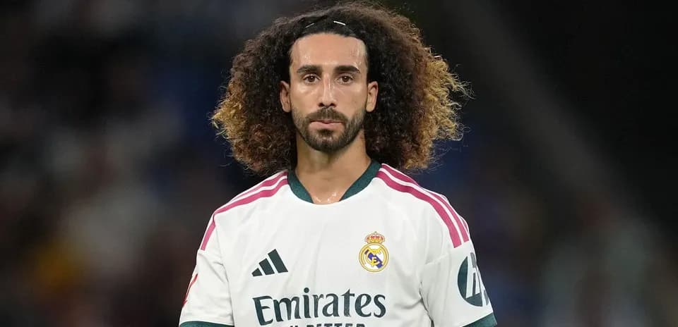 Player wearing Real Madrid jersey on the field