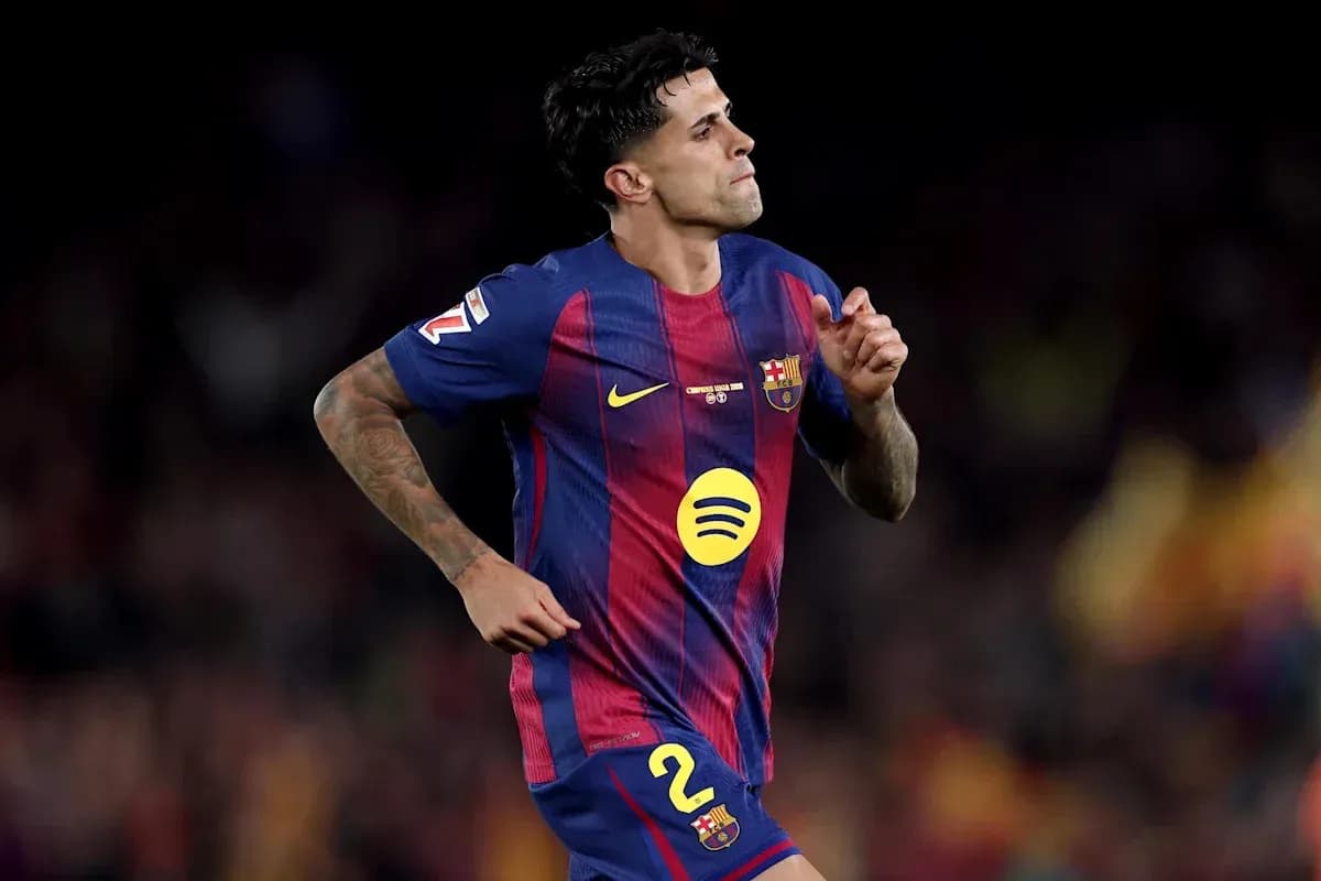 Player in FC Barcelona kit running on the pitch