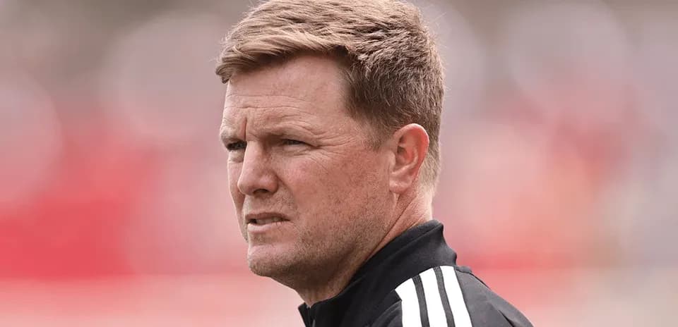 Coach observing during a match or training session