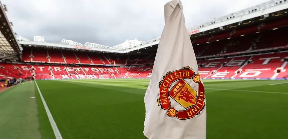 Corner flag with Manchester United logo at stadium