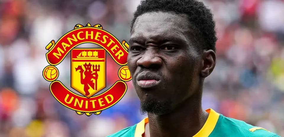 Player wearing green jersey with Manchester United logo