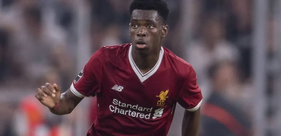 Player running during a Liverpool FC match