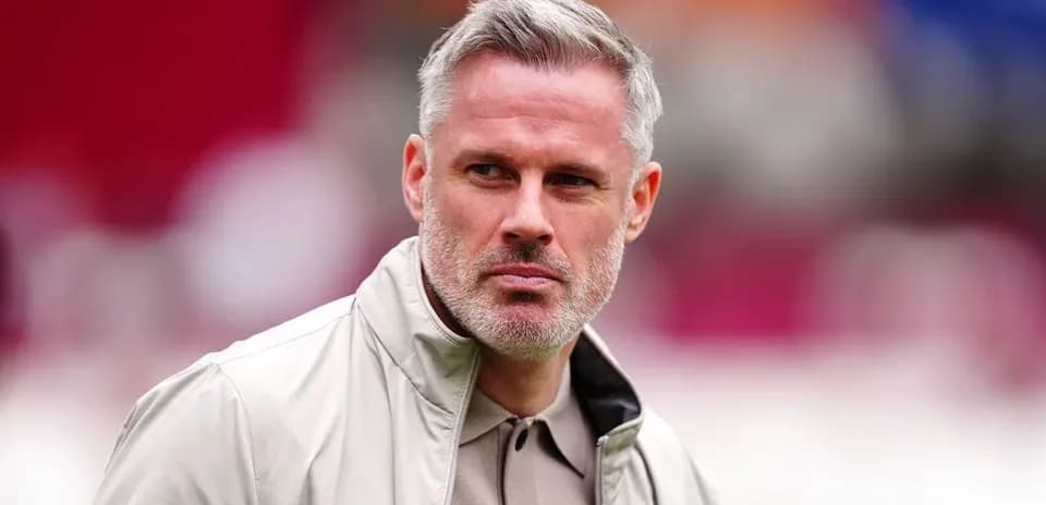 Man with silver hair wearing a light jacket