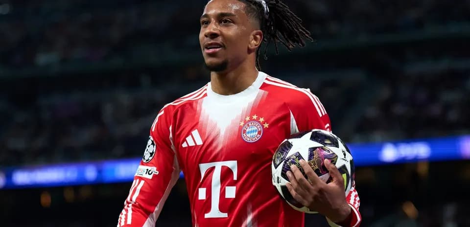 Player holding a ball during UEFA Champions League match