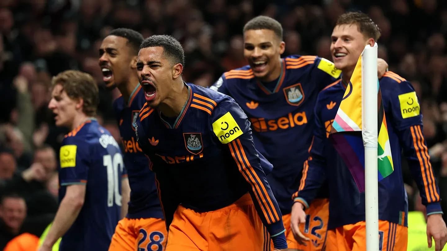 Newcastle players celebrating a goal during match