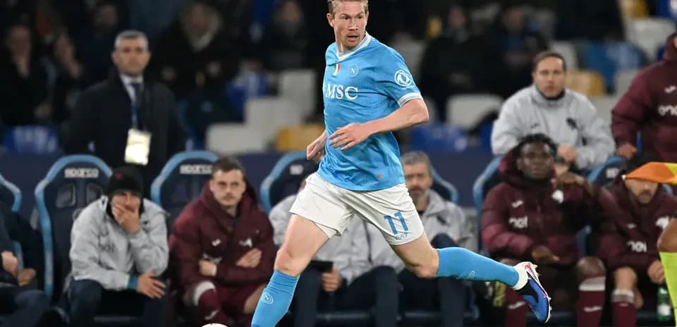 Player in light blue kit running with ball