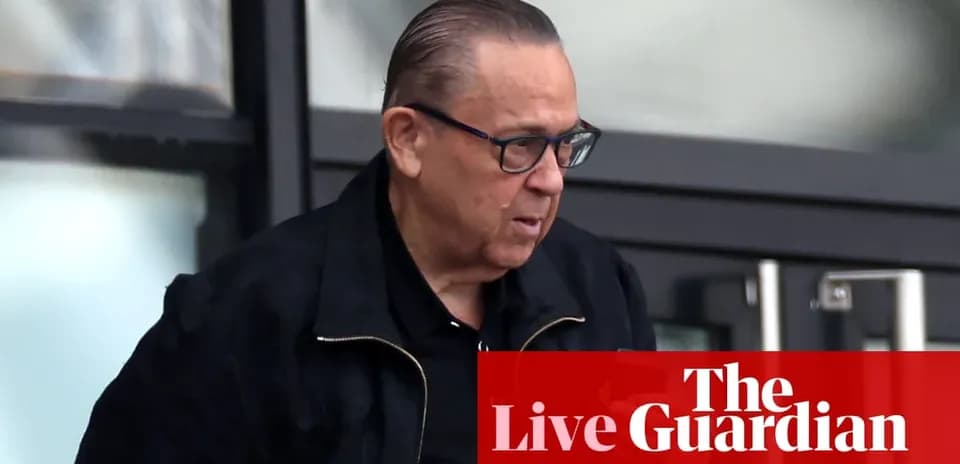 Man wearing glasses walking outside building
