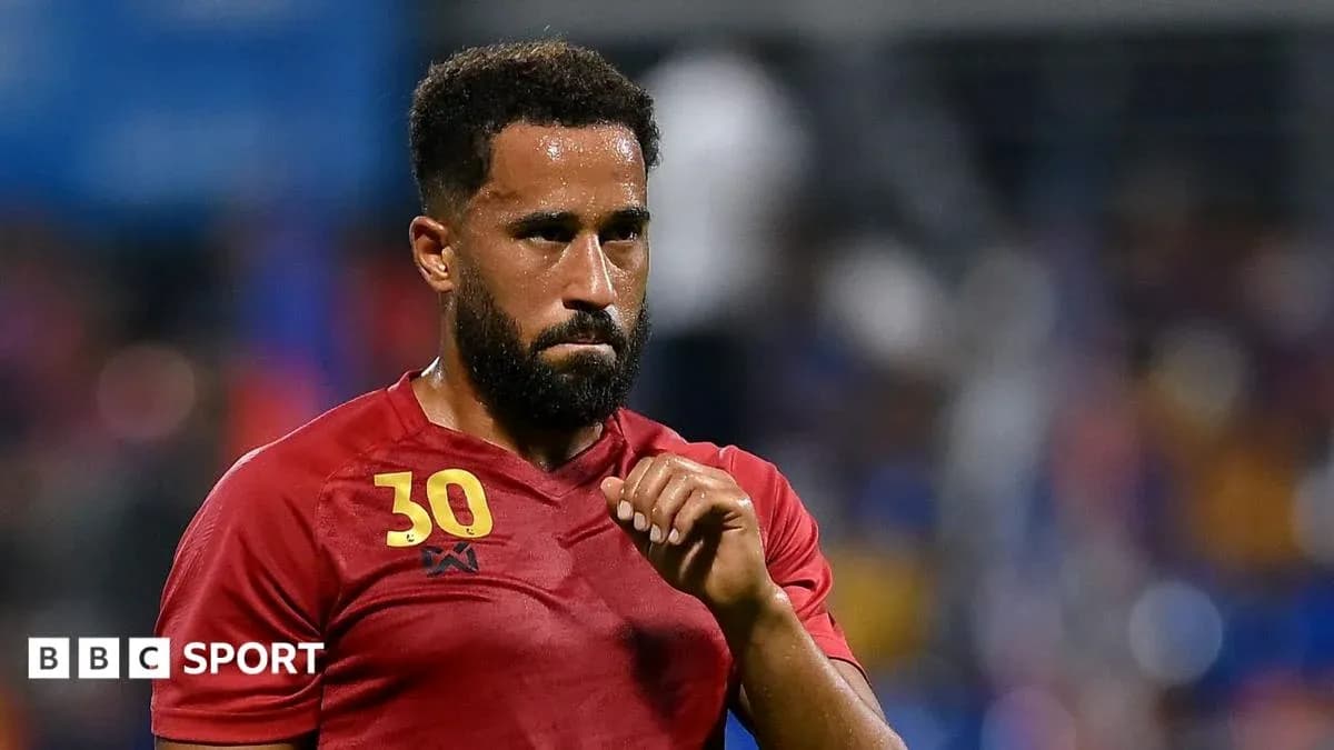 Player wearing red jersey during match action Player wearing red jersey during match action