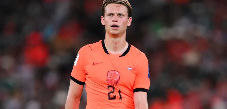 Player wearing orange jersey on the field