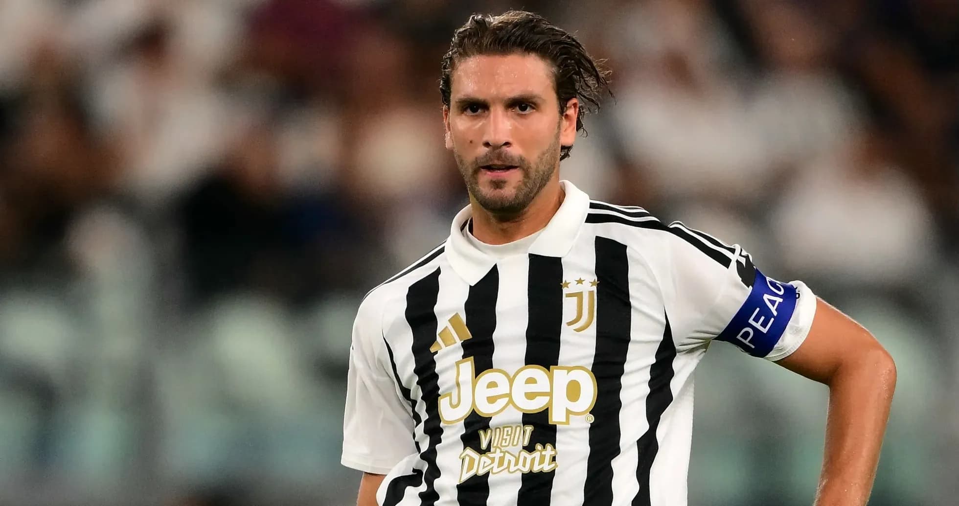 Juventus player in home kit during match