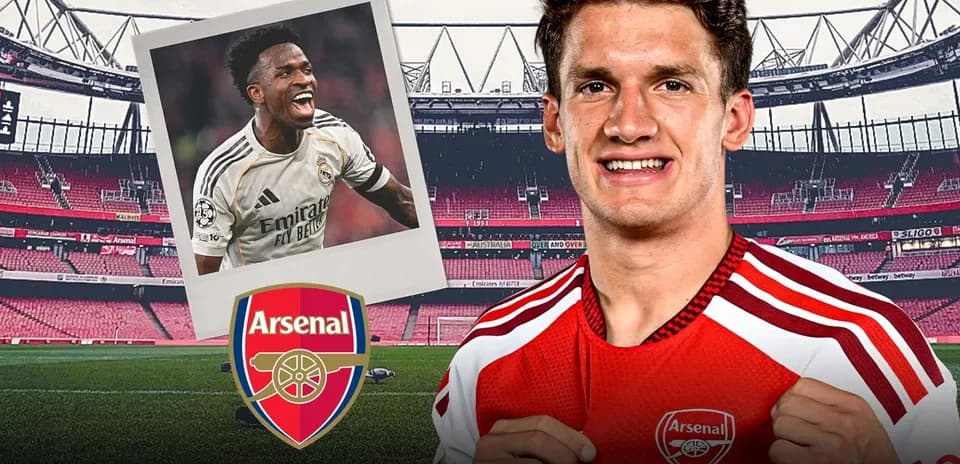 Player in Arsenal kit smiling at stadium