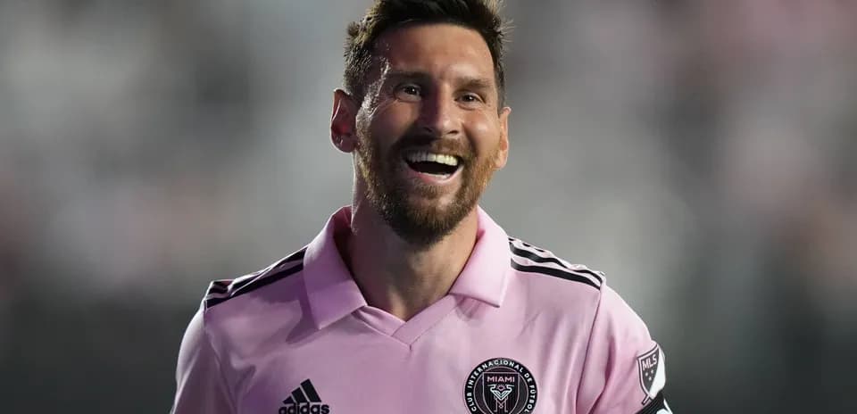 Player smiling in pink Inter Miami jersey