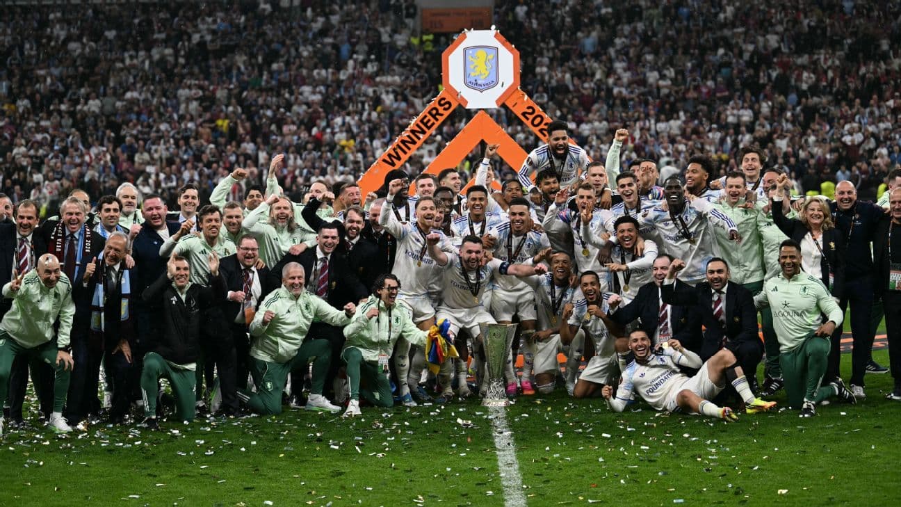 Aston Villa celebrating victory with trophy at Wembley