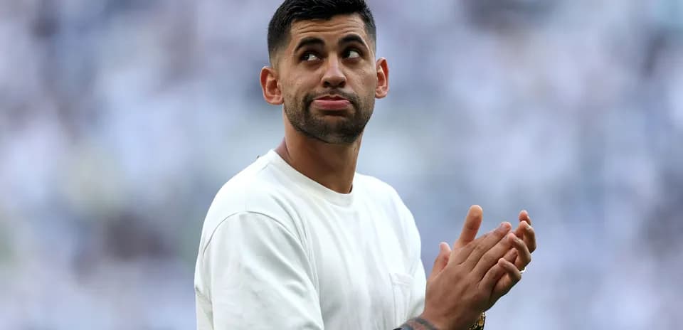 Player applauding in a stadium during match