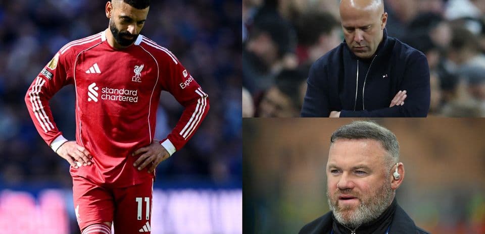 Liverpool player looking dejected; coaches observing match