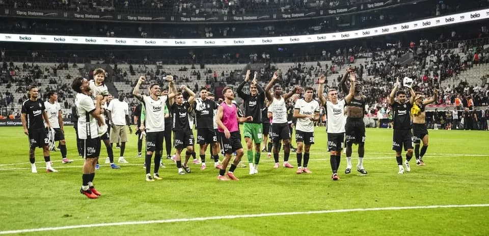Beşiktaş players celebrating victory on the field