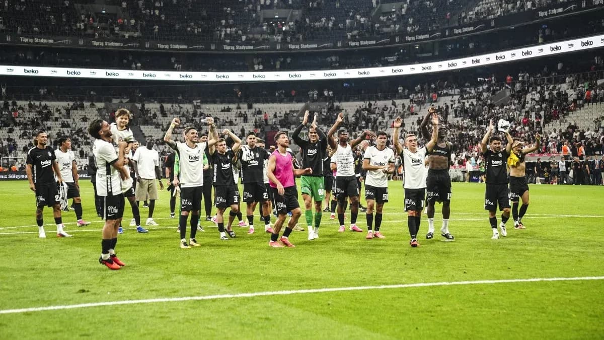 Beşiktaş players celebrating victory on the field