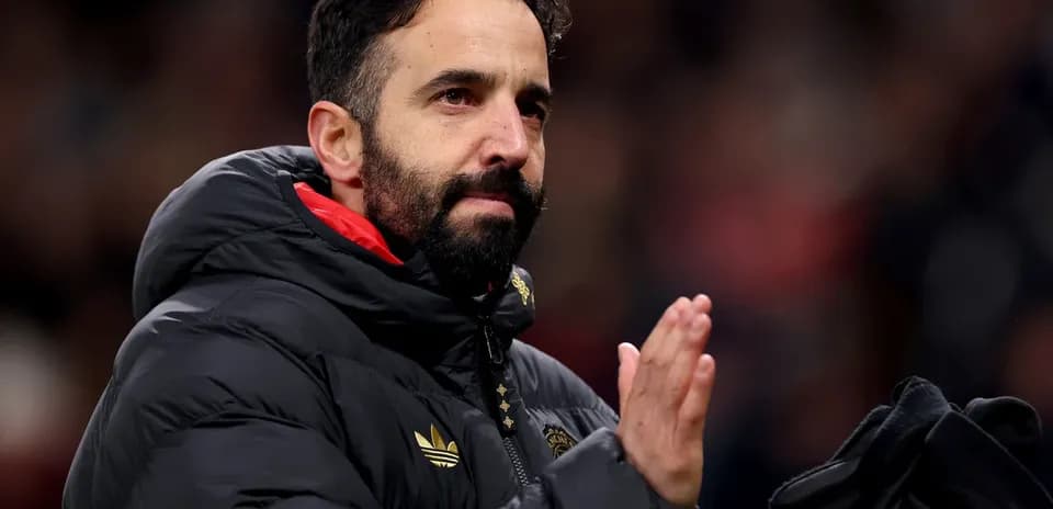 Coach applauding the fans after the match