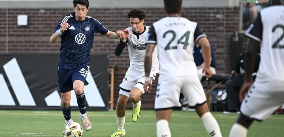 Player dribbling the ball during Chattanooga match
