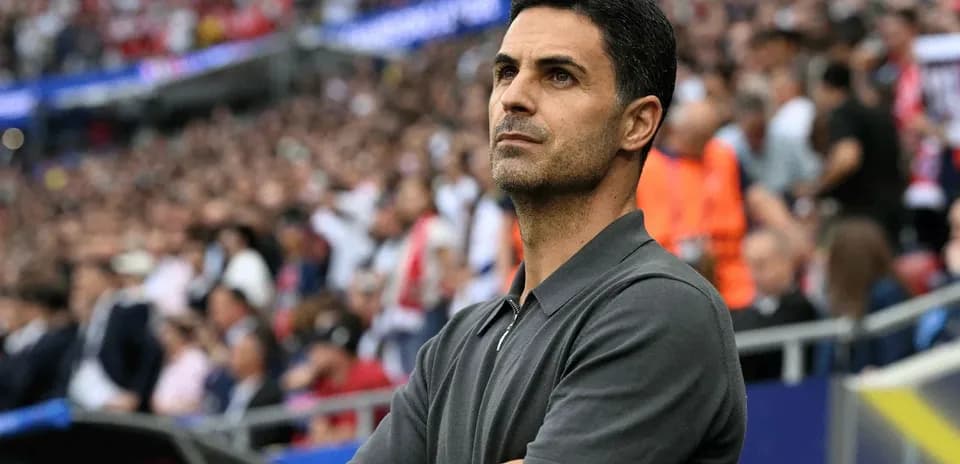 Manager observing match from the sidelines