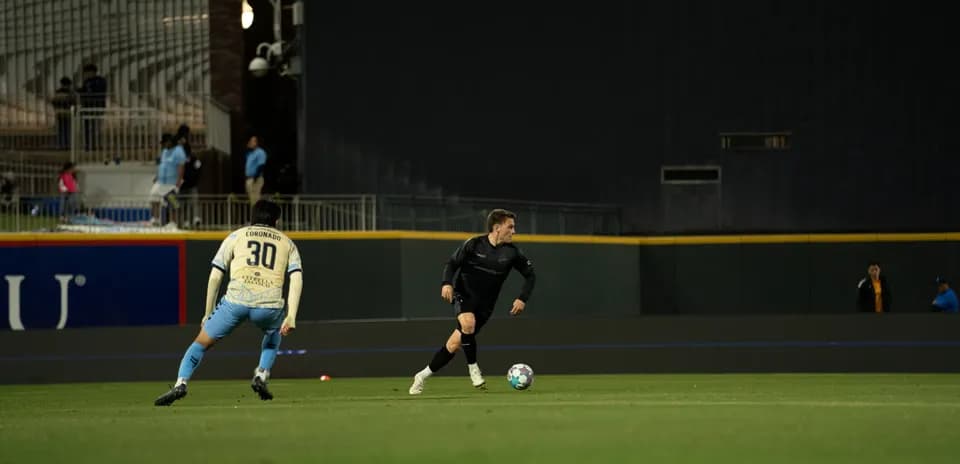 Player dribbling the ball during match