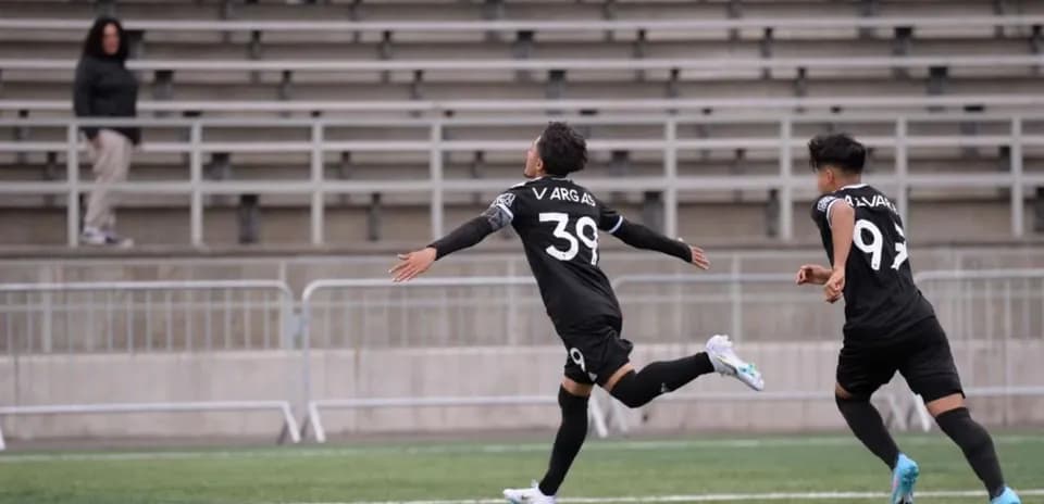 Player celebrating a goal in football match