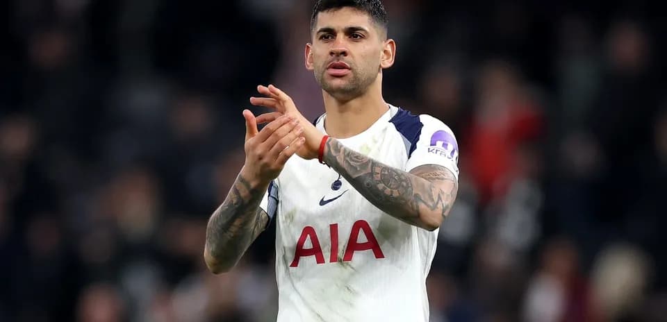 Player applauding fans after match at stadium