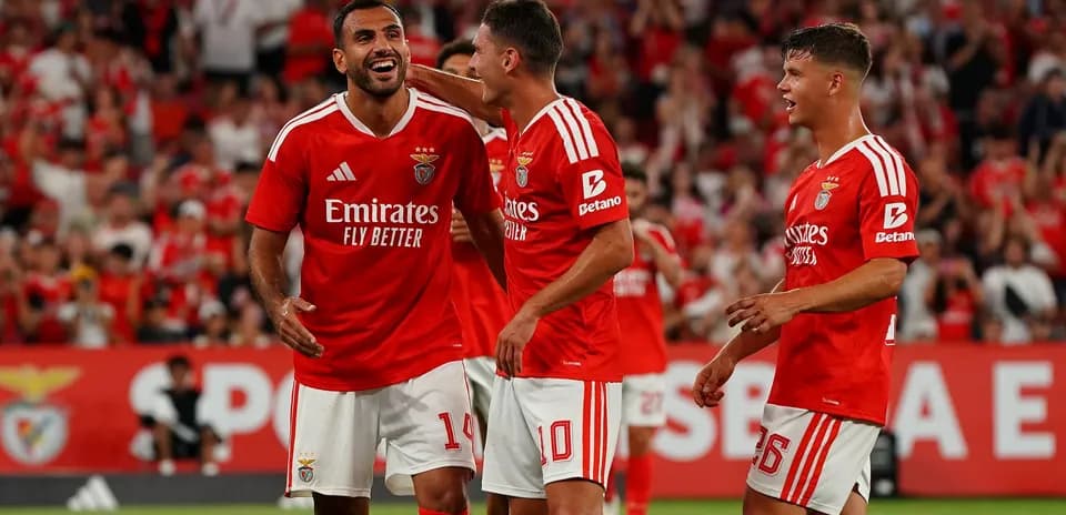 Benfica players celebrating a goal during match