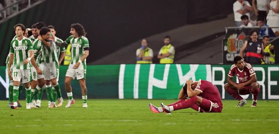 Players reacting after a goal during the match