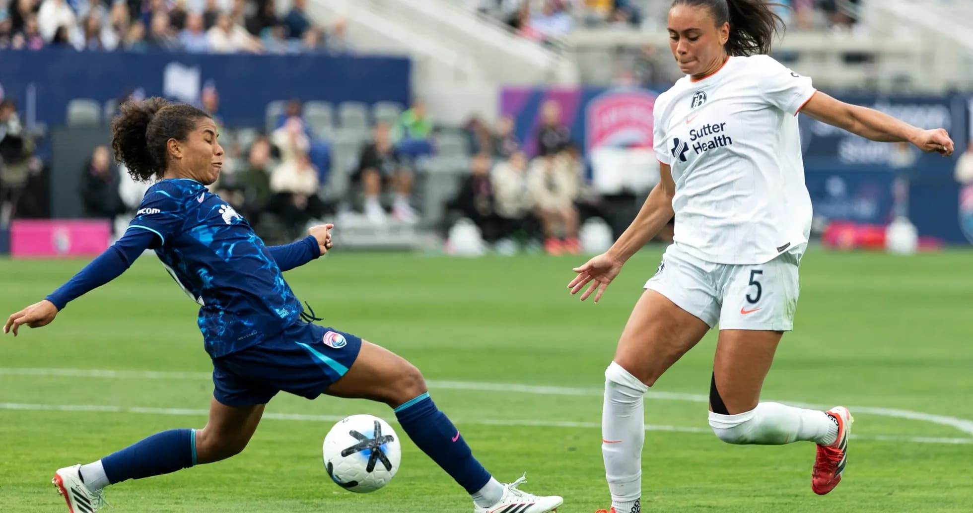 San Diego Wave player dribbling past Bay FC defender