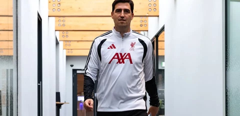 Football player walking in Liverpool training facility