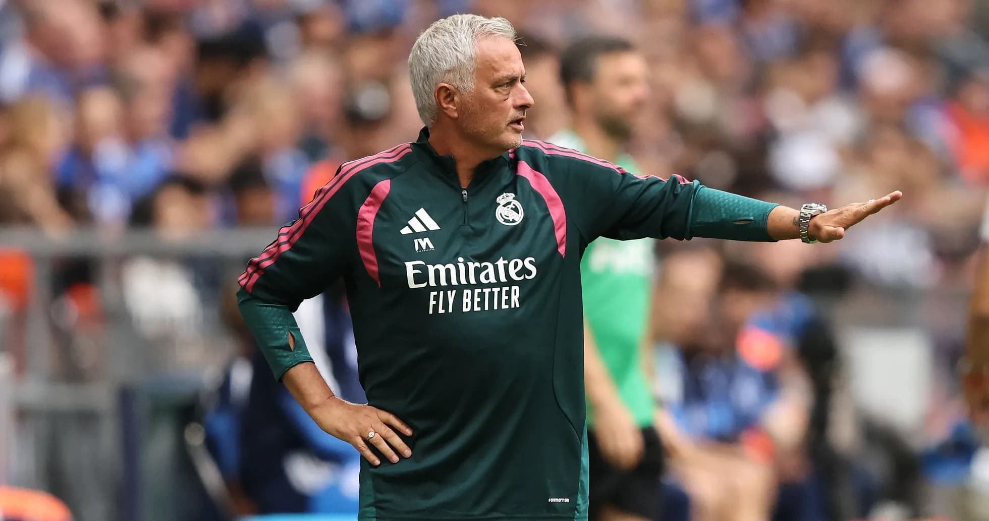 Coach directing players during a match