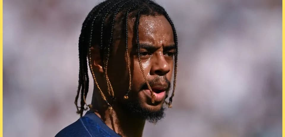 Player with braided hair during match action