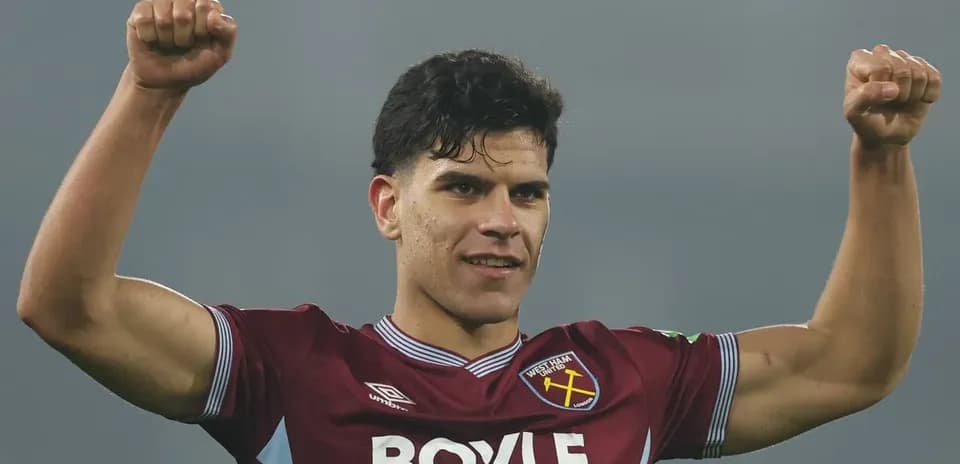 Player celebrating victory with raised arms
