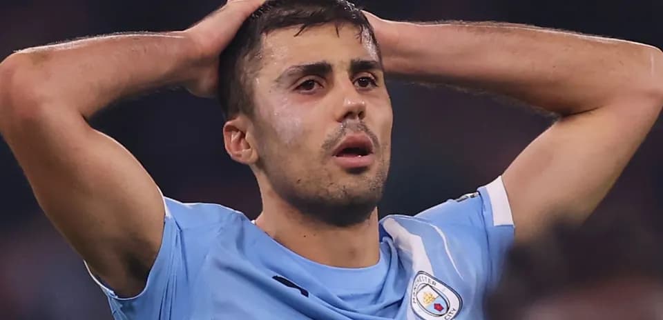 Player holding head in disappointment during match