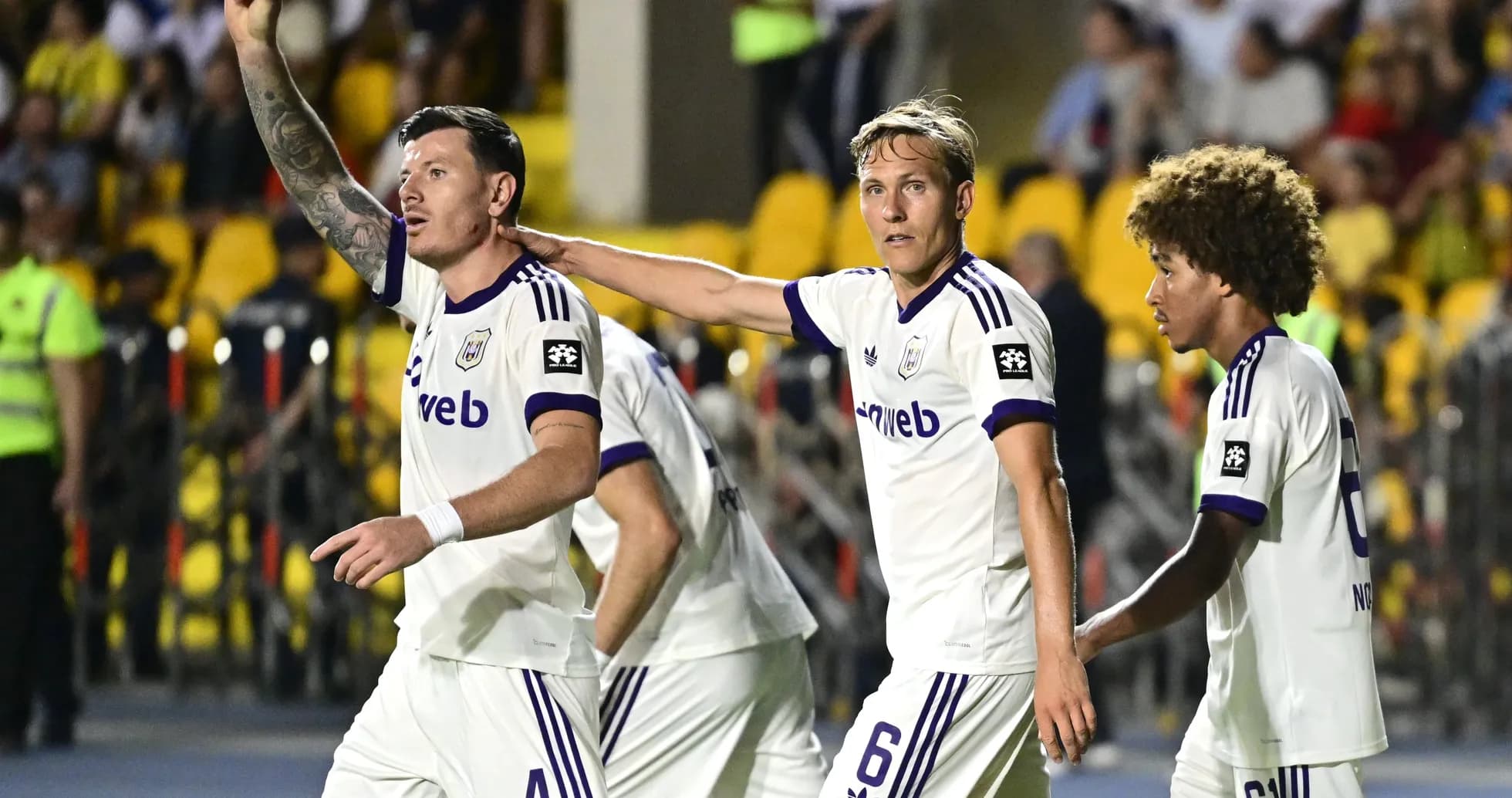 Anderlecht players celebrating during a match