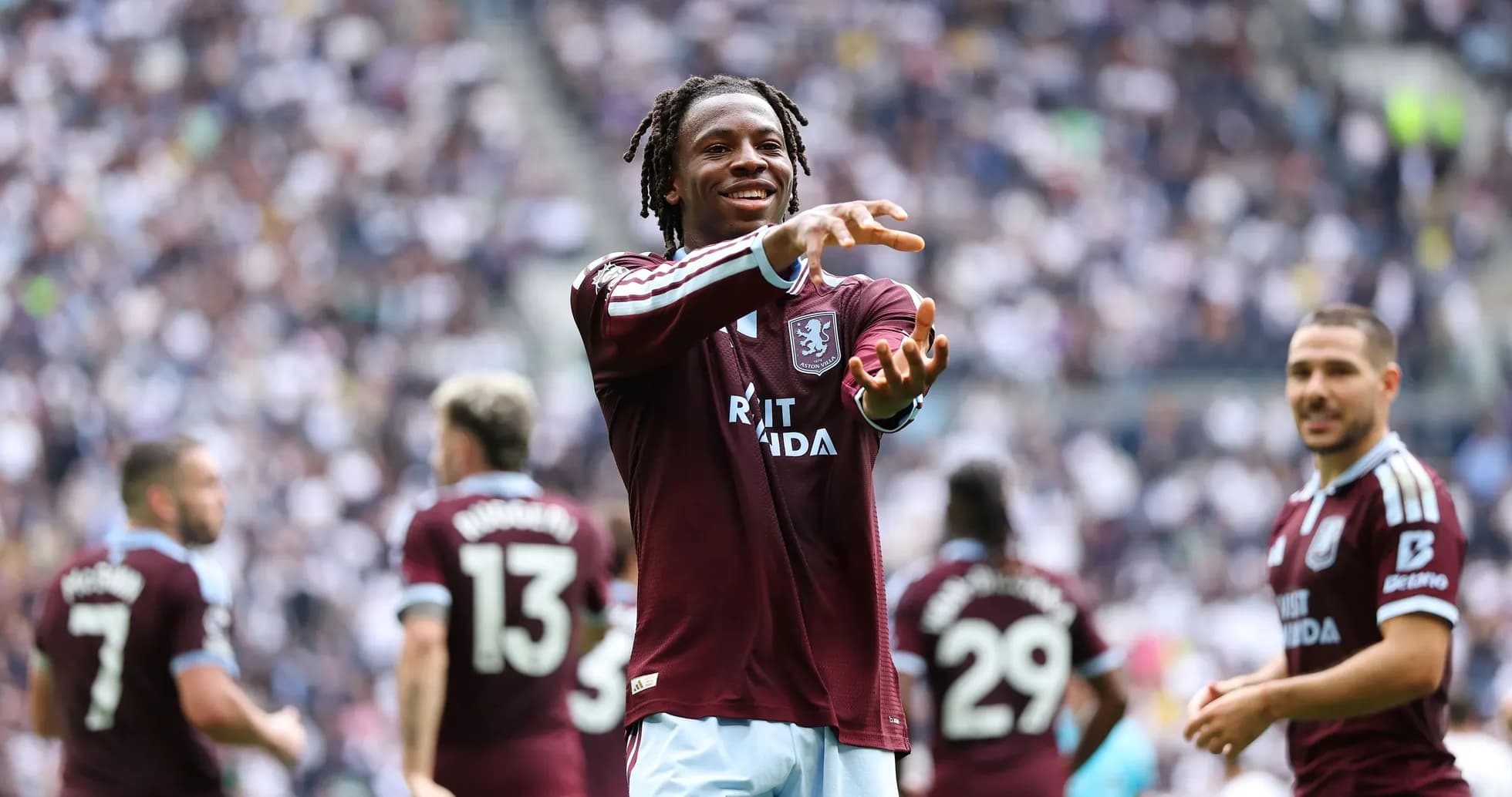 Aston Villa player celebrating during match action