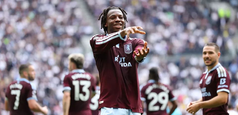 Aston Villa player celebrating during match action