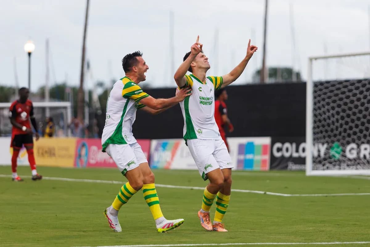 Tampa Bay Rowdies players celebrating a goal