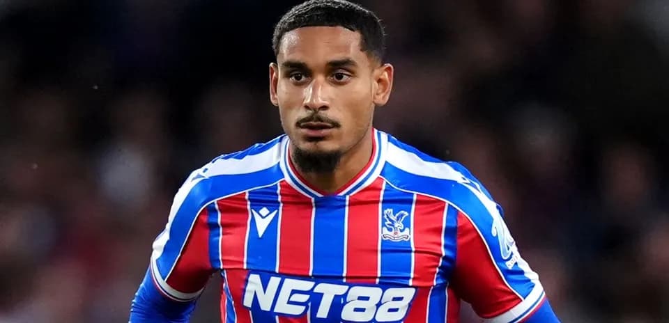 Player in Crystal Palace kit during match action