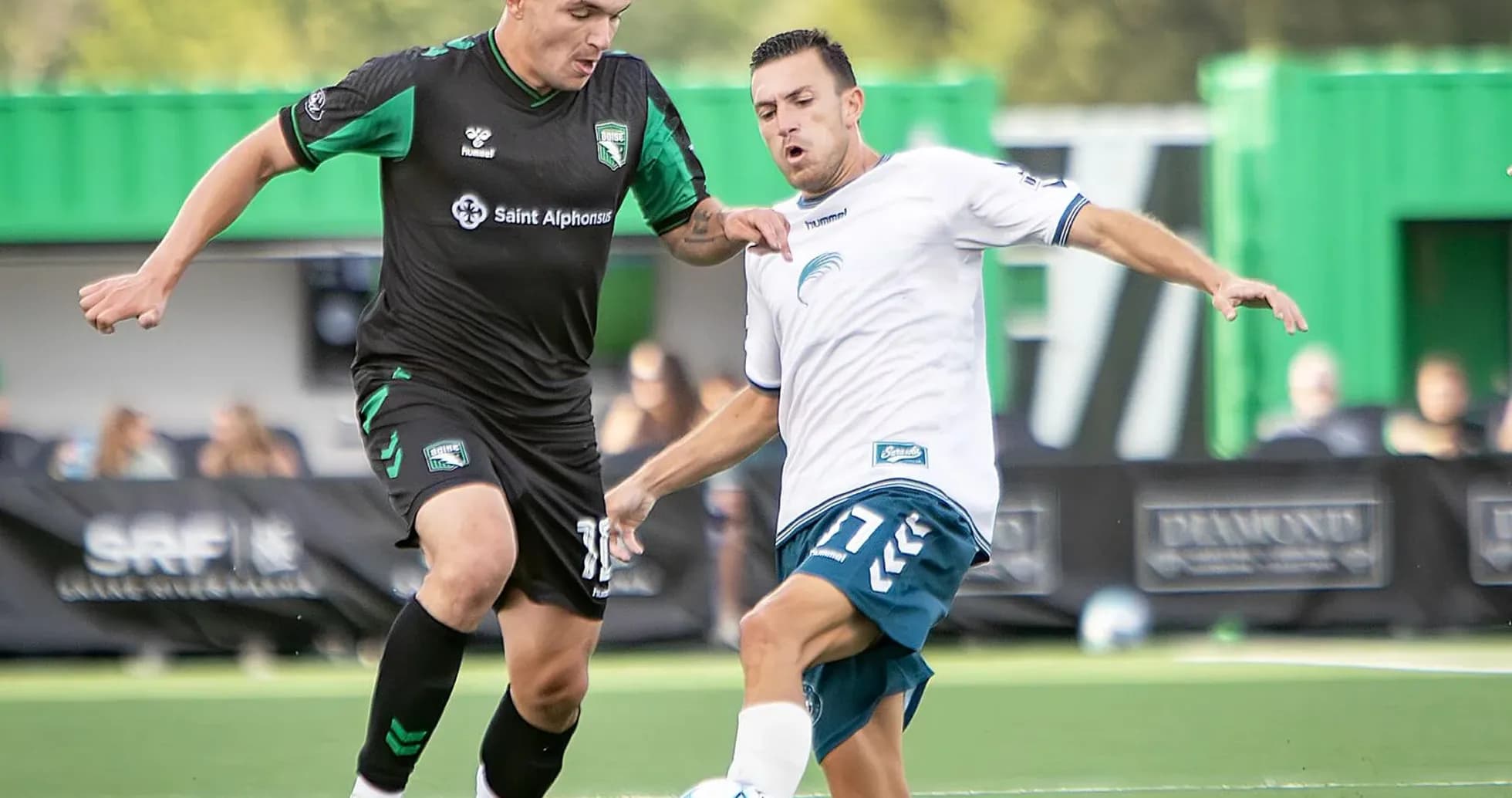 Player tackling opponent during Spokane Velocity match