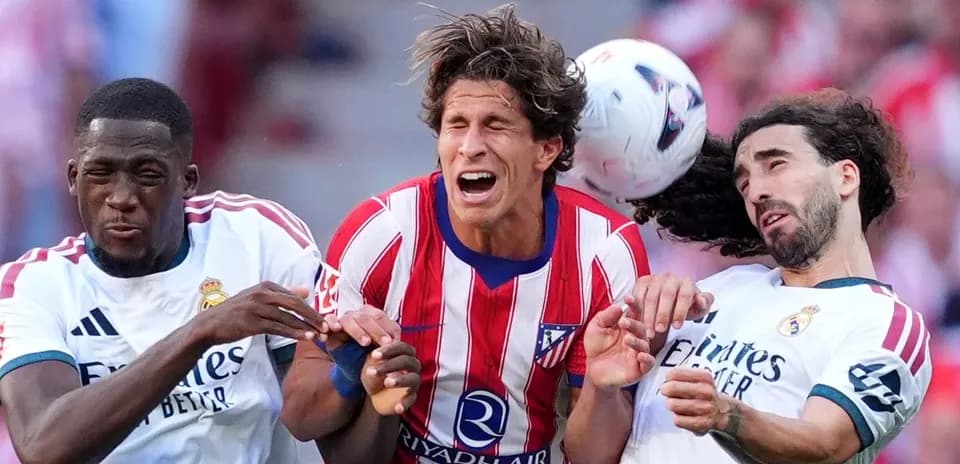 Players colliding while contesting for the ball