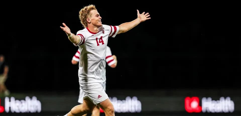 Player celebrating after scoring a goal during match