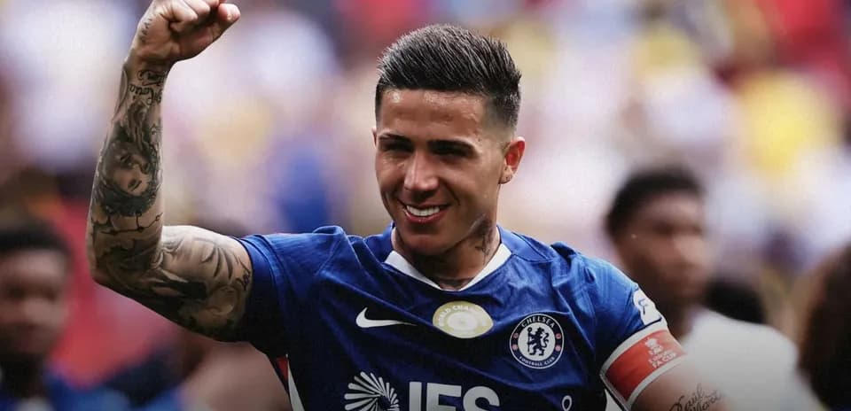 Player celebrating after a match wearing Chelsea jersey