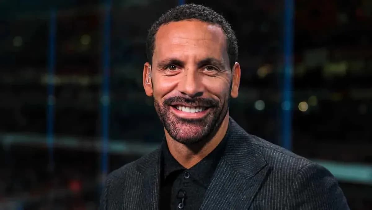 Sports analyst smiling in studio setting
