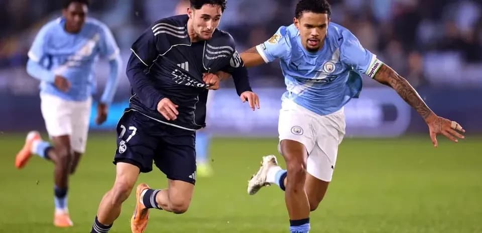 Players from Real Madrid and Manchester City in action