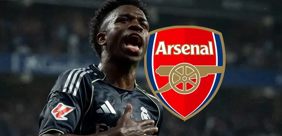 Player celebrating in front of Arsenal logo